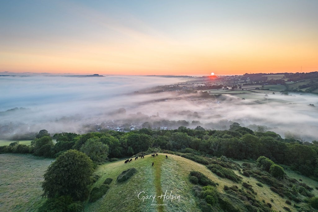 Aerial Sunset Photography of a misty morning